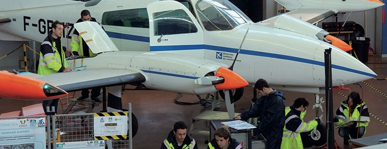 Students working on an aircraft