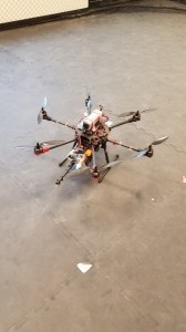 Multi rotor UAV sitting on ground in room