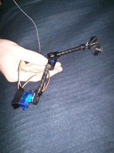 Drone arm used to scoop dirt