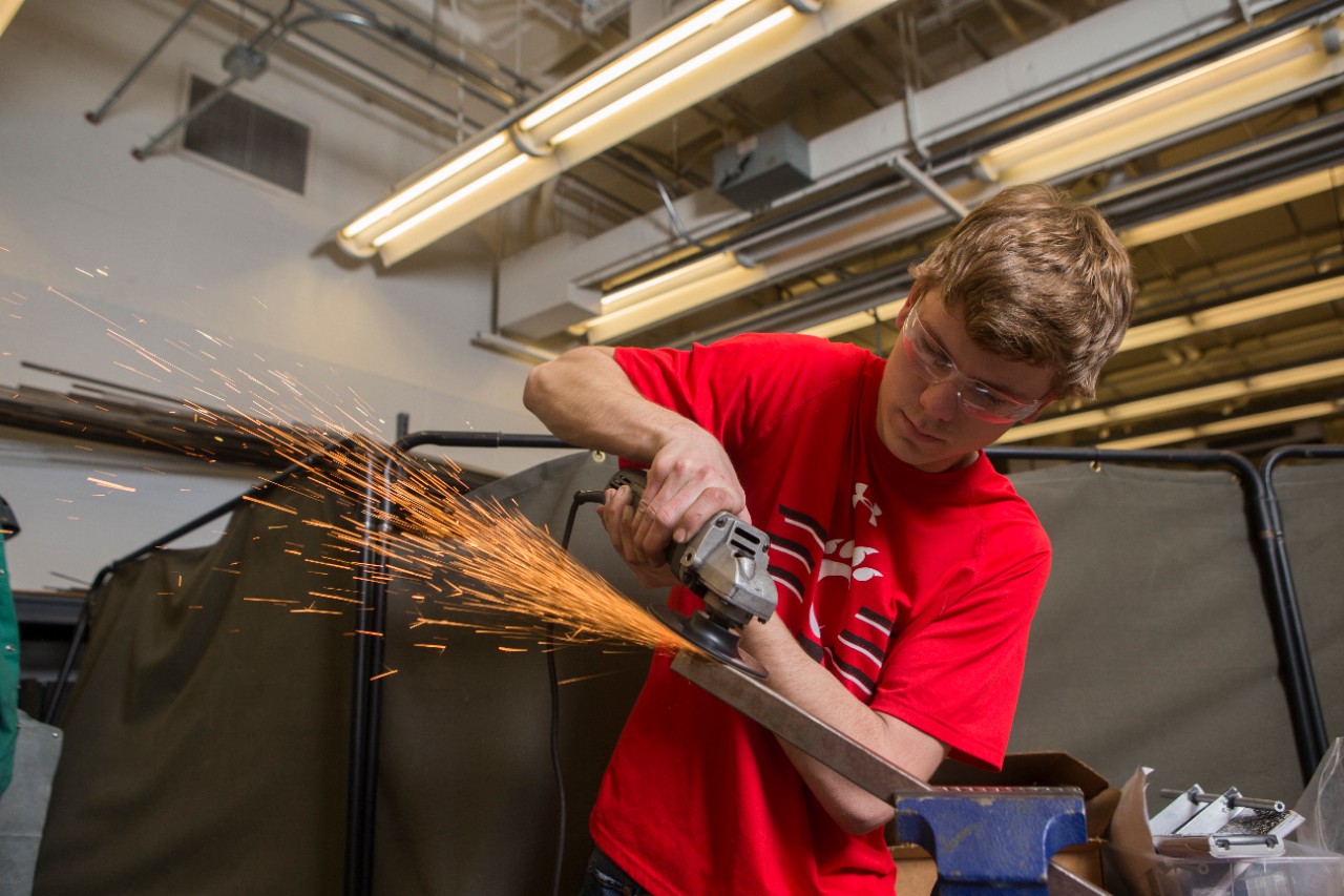 CEAS Photo shoot in the Mechanical Engineering Bearcat Motorsports Professor Randy Allemang & Student Captain Jacob Frisco with UC students at ERC. UC/Joseph Fuqua II