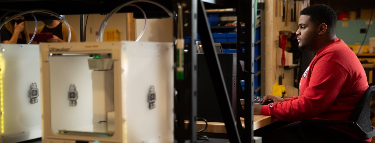 Engineering students pose at the 1819 iHub for marketing photography.