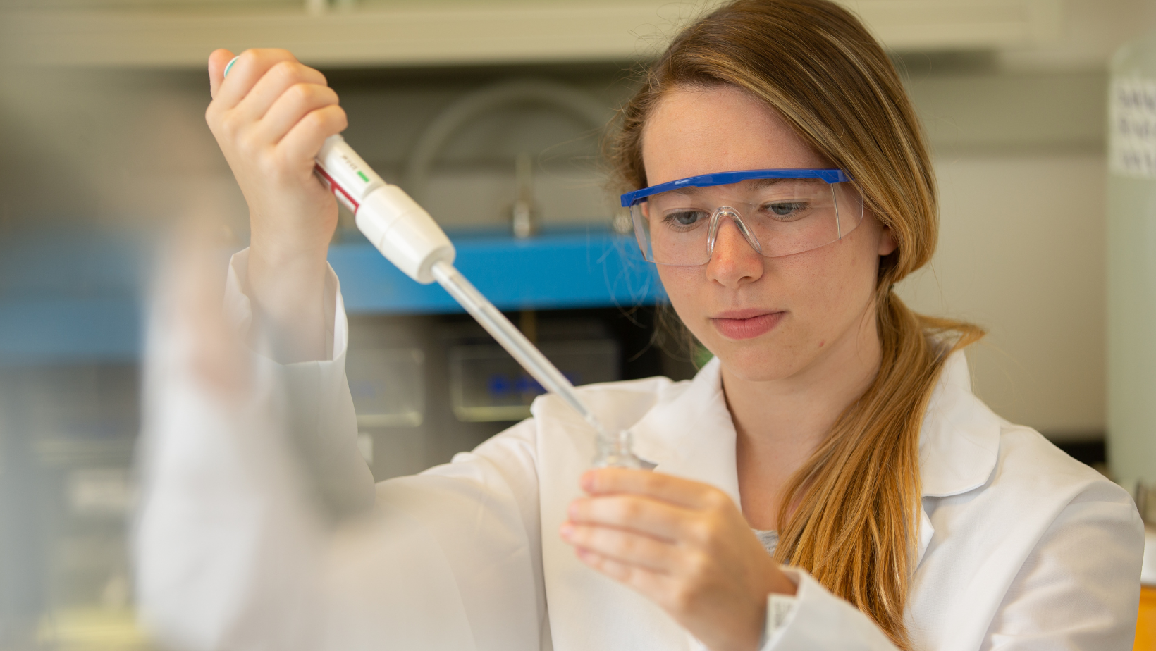 Student using a pipette