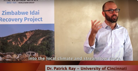 Man speaks to a class